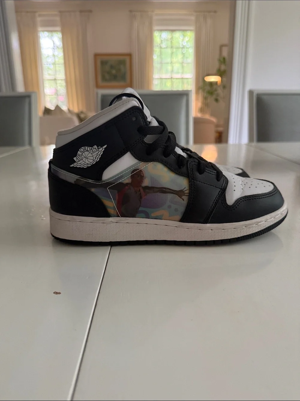 Jordan Kids Black and White Mid-Top Sneakers with Holographic Side Panel